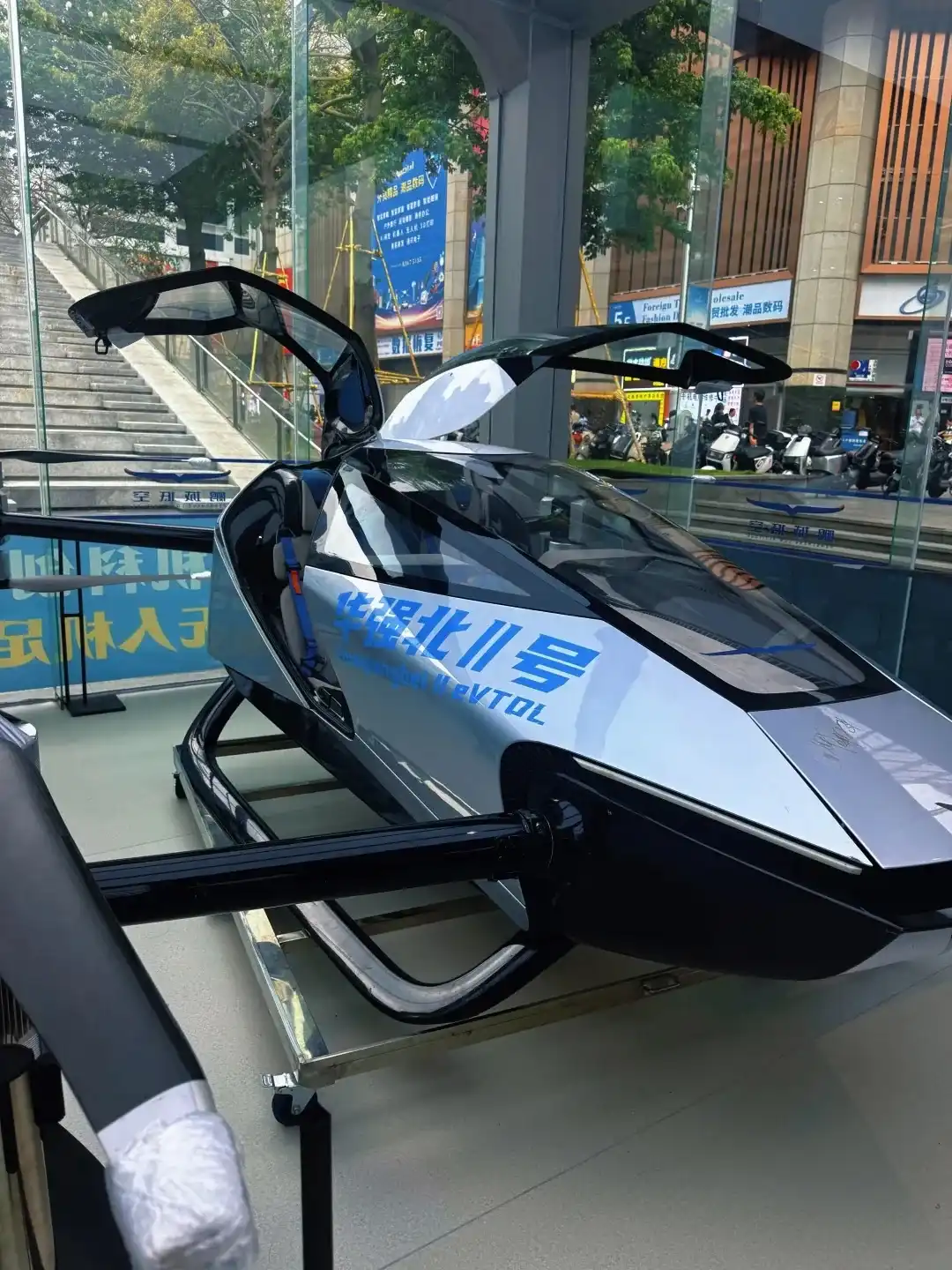 Flying-car model inside a Huaqiangbei electronics market