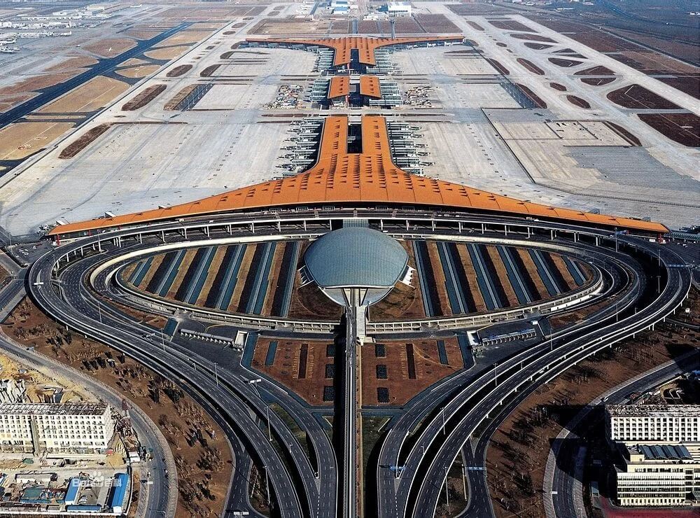 Terminal exterior and airport sign at Beijing Capital International Airport