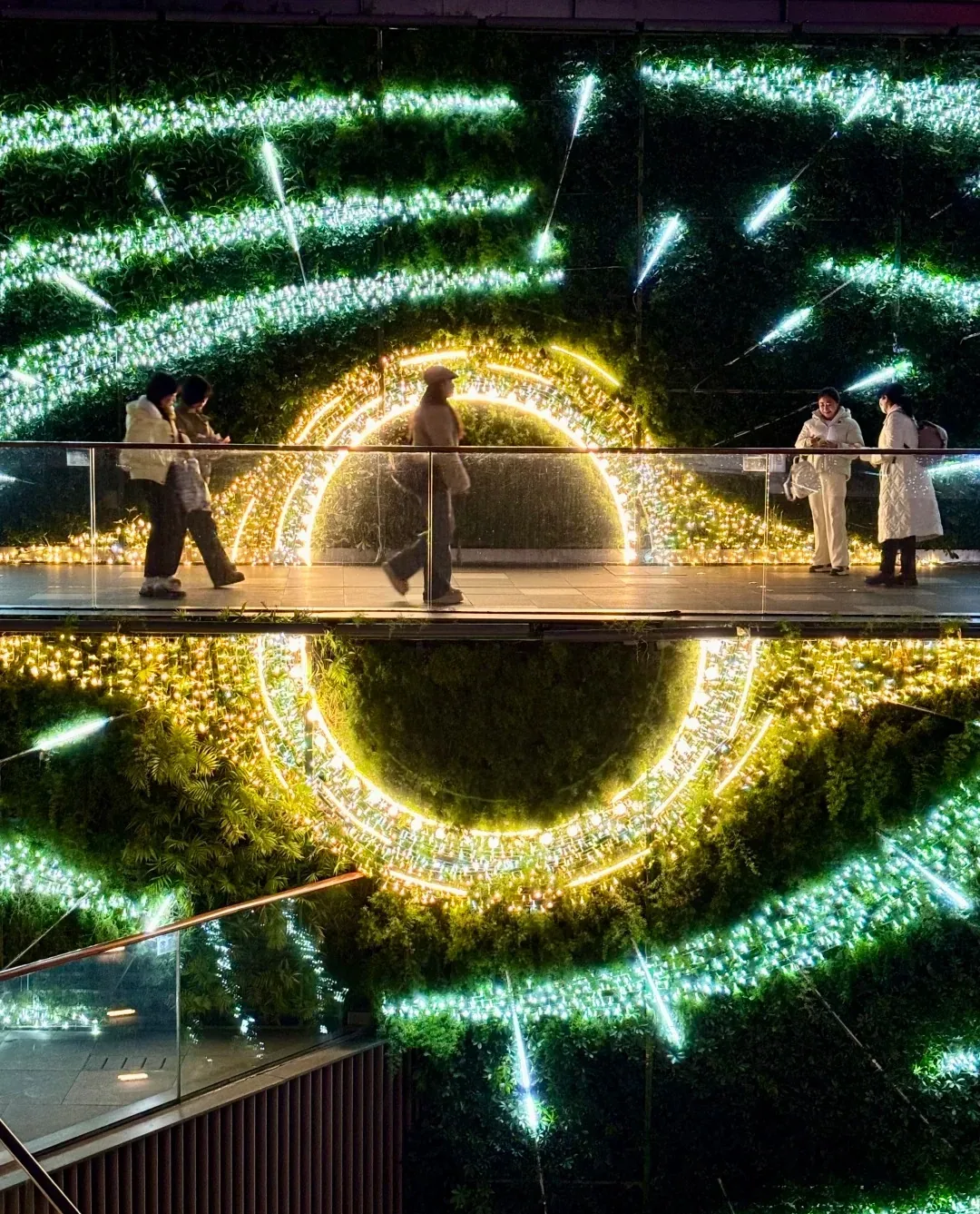 Circular light installation reflected at night