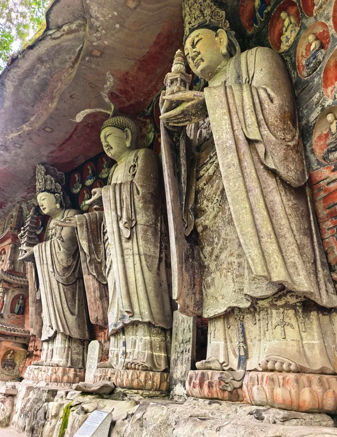 Carved drapery and gestures