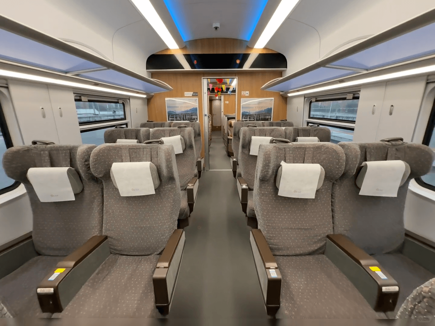 Typical two plus two seating in a Chinese high-speed train First Class carriage