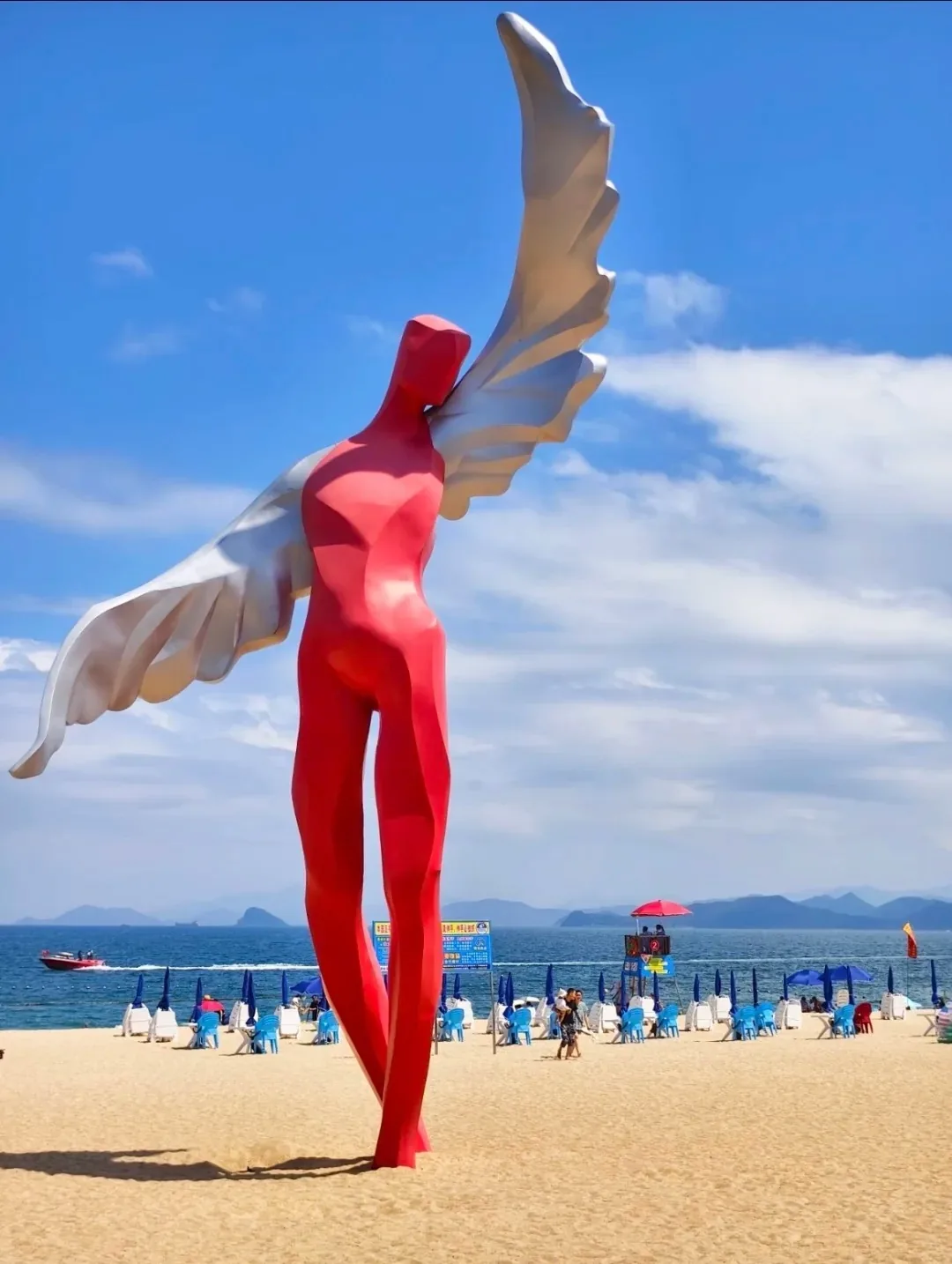 Red Winged Man sculpture at Dameisha