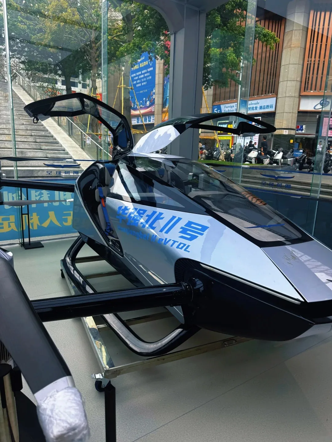 Flying-car model inside a Huaqiangbei electronics market