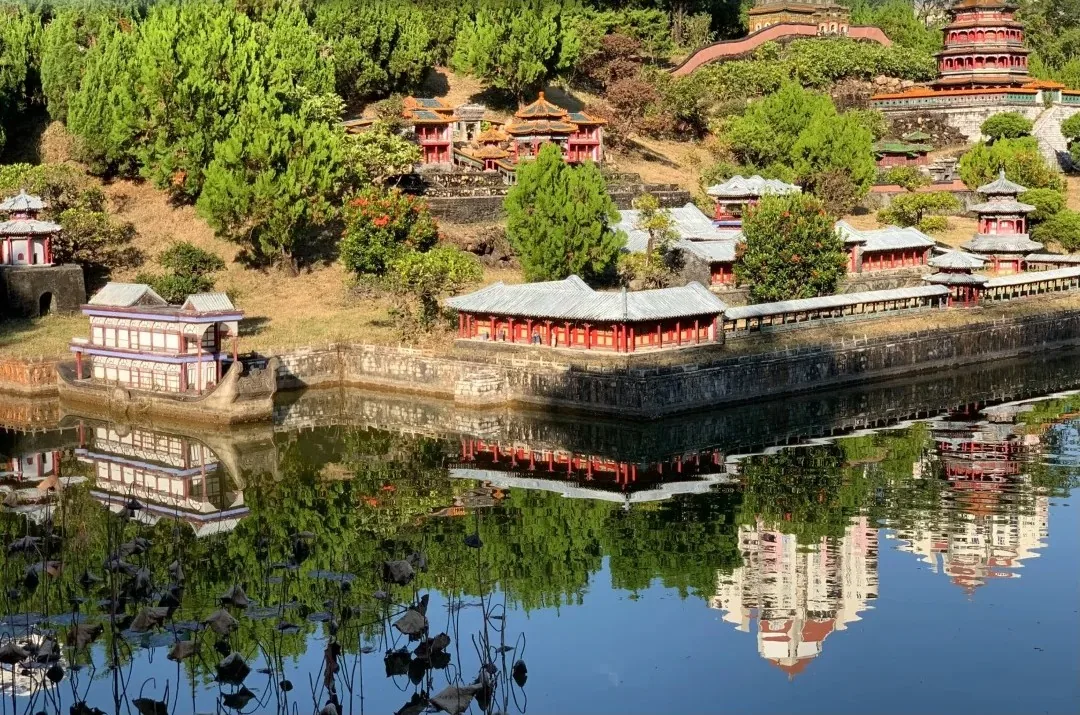 Chinese architectural miniatures beside the lake