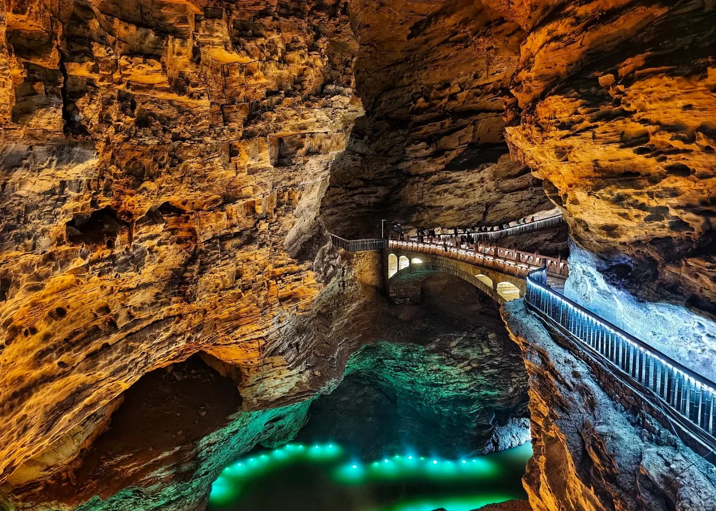 A large illuminated cave chamber