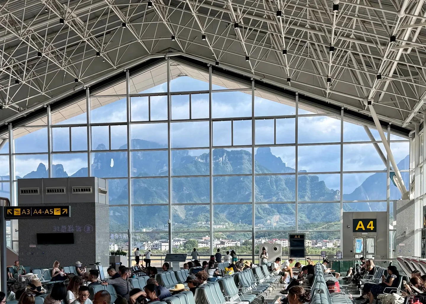Tianmen Mountain seen through the terminal windows at Zhangjiajie Hehua International Airport